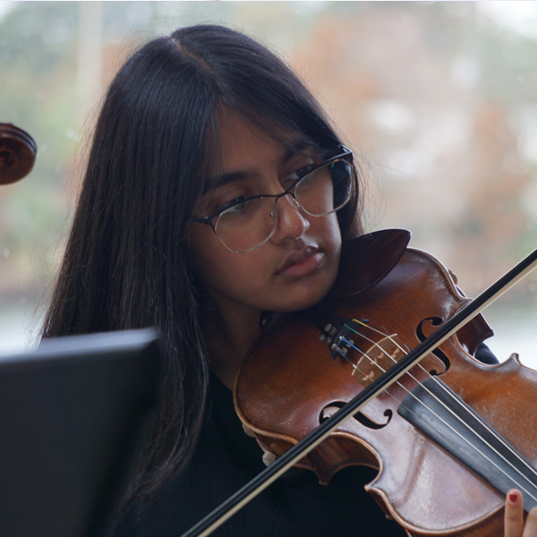 Student playing Violin